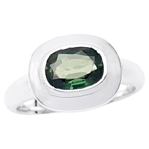 Green Sapphire Ring set in 18K White Gold Settings