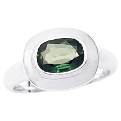 Green Sapphire Ring set in 18K White Gold Settings