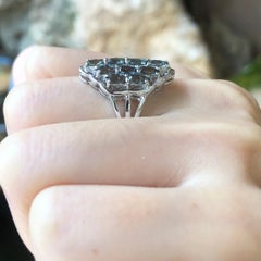 Green Sapphire Ring set in Silver Settings