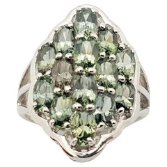 Green Sapphire Ring set in Silver Settings