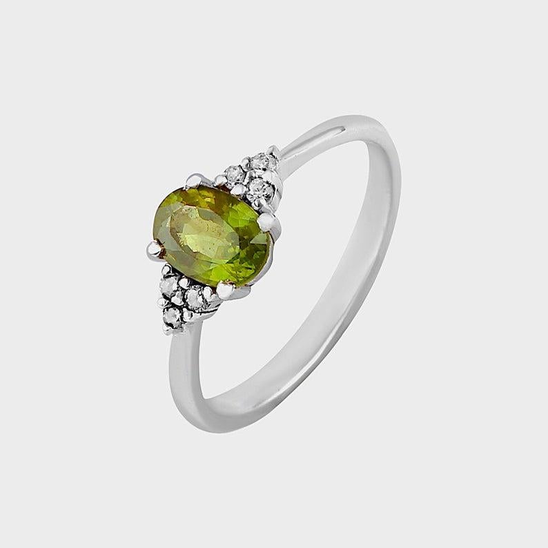 women green sapphire ring