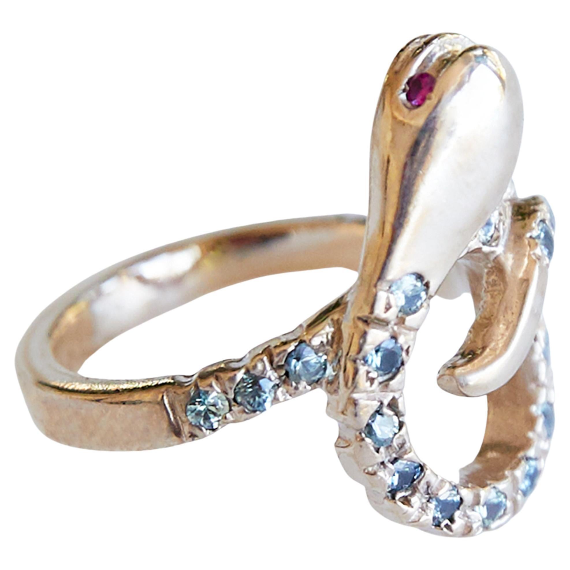 Animal jewelry Green Sapphire Ruby Gold Snake Cocktail Ring Victorian Style J Dauphin
This gem has 29 Sapphires and 2 Ruby Eyes
14 k Gold

J DAUPHIN 