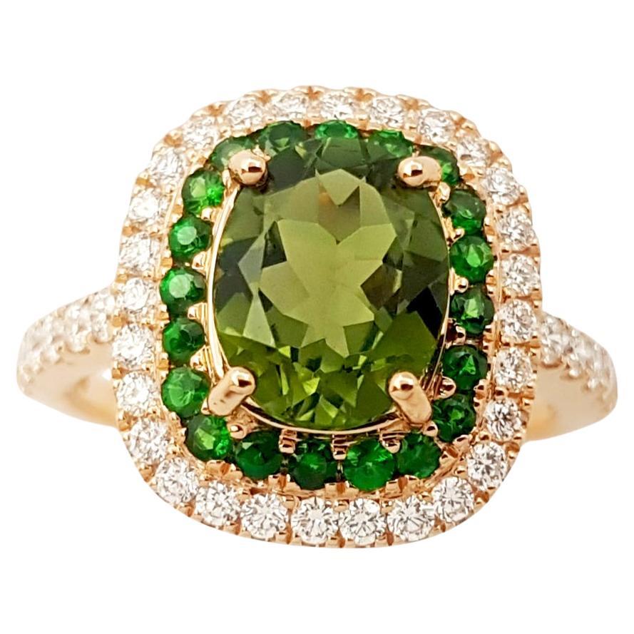 Bague en or rose 18 carats sertie de saphir vert, tsavorite et diamants