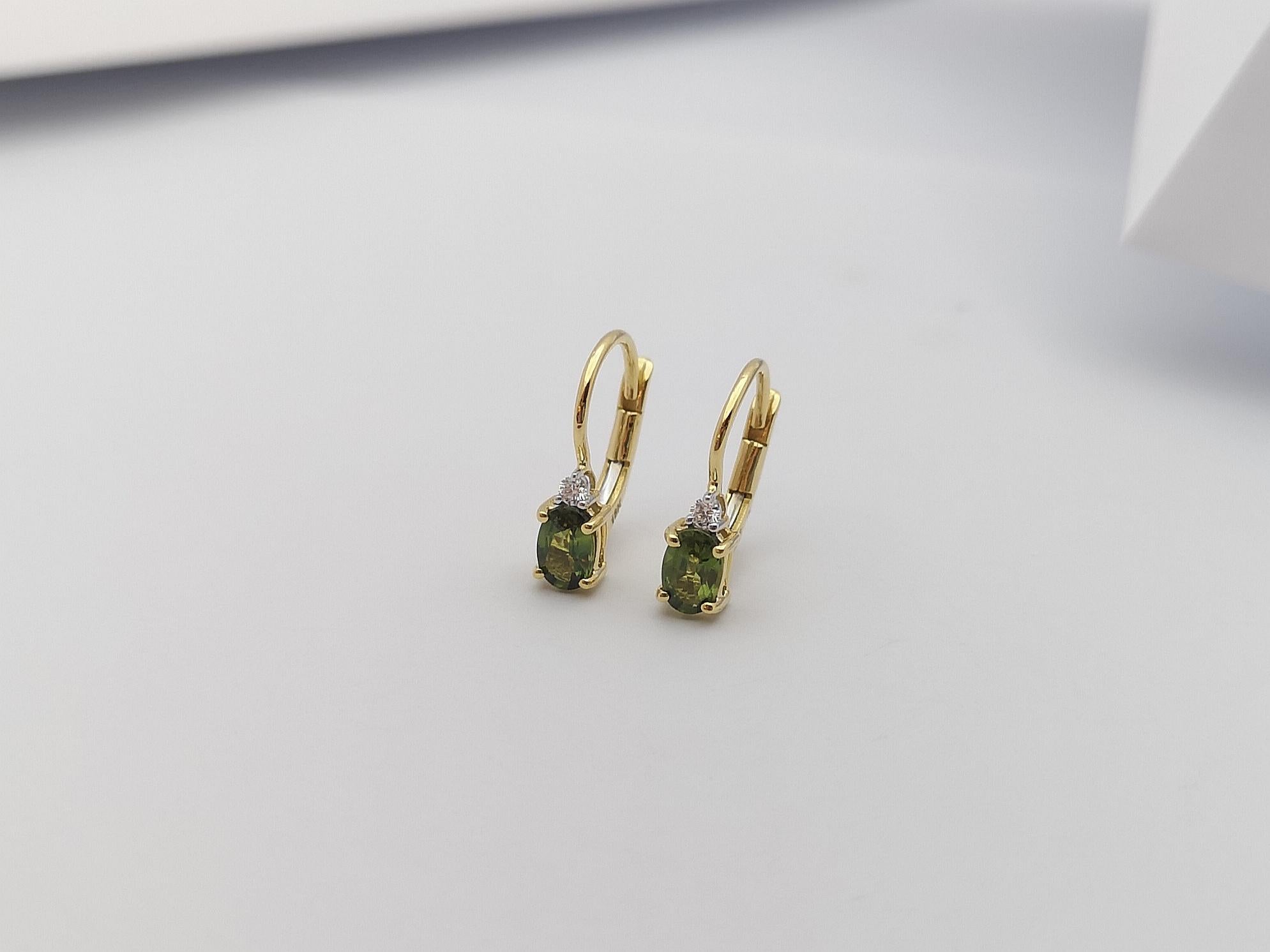 Donna Orecchini con zaffiro verde e diamanti con montatura in oro 18 carati in vendita