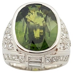 Parure Ing en or blanc 18 carats sertie d'un saphir vert et de diamants