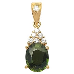 Green Sapphire with Diamond Pendant set in 18K Gold Settings