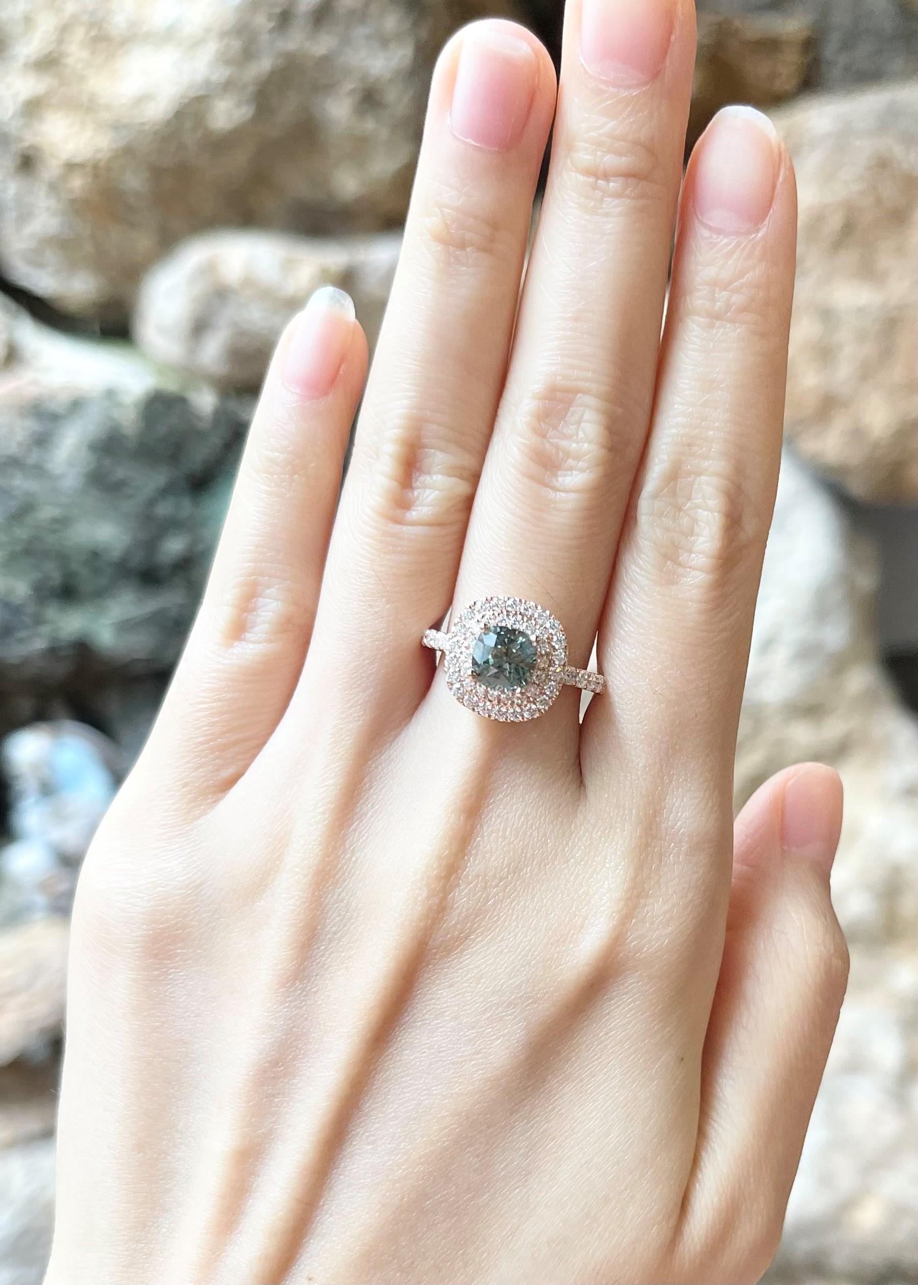 Unheated Green Sapphire 2.22 carats with Diamond 0.81 carat Ring set in 18K Rose Gold Settings
(Certified by GIT: Gem and Jewelry Institute of Thailand)

Width:  1.3 cm 
Length: 1.3 cm
Ring Size: 54
Total Weight: 6.44 grams

