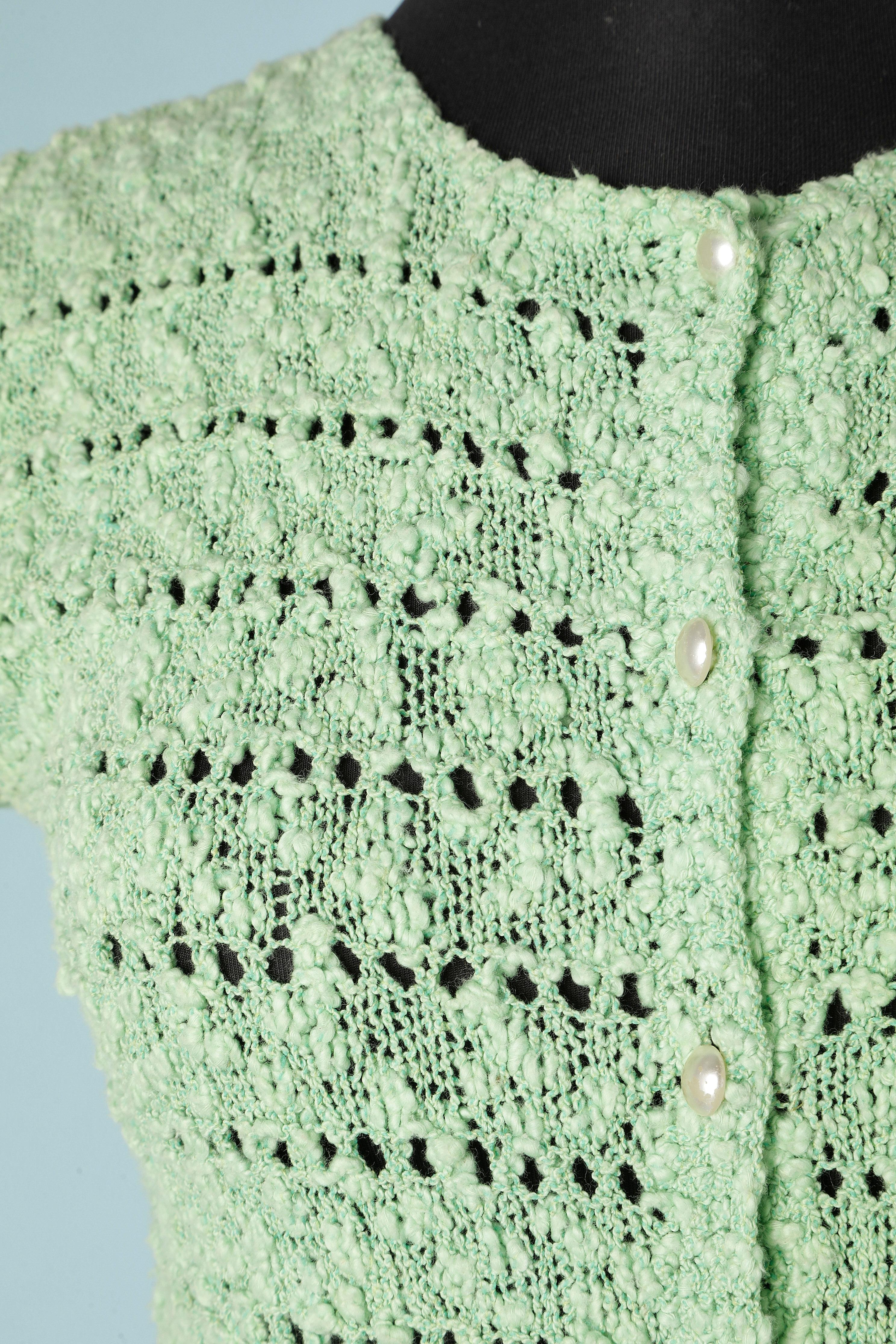 Green see-throught knit dress. Button and buttonhole closure on the middle front. elastic waist 
SIZE S 