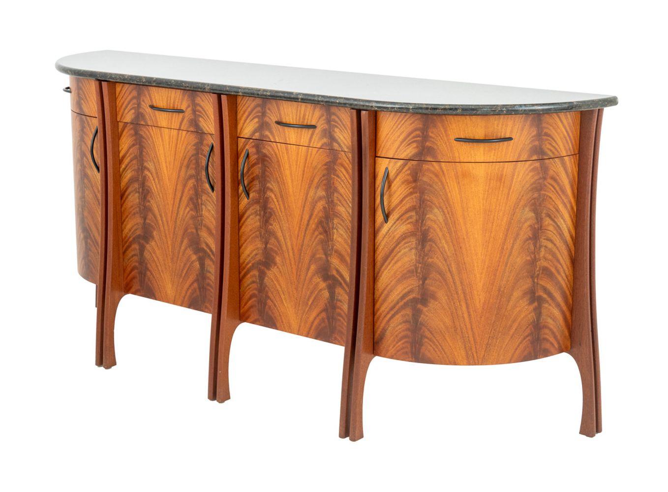 Green Serpentine and Flame Birch Demilune Sideboard, with four tiger maple drawers above four doors opening to shelves and storage compartments, the two curved end drawers when fully extended drop for complete access. 38.5