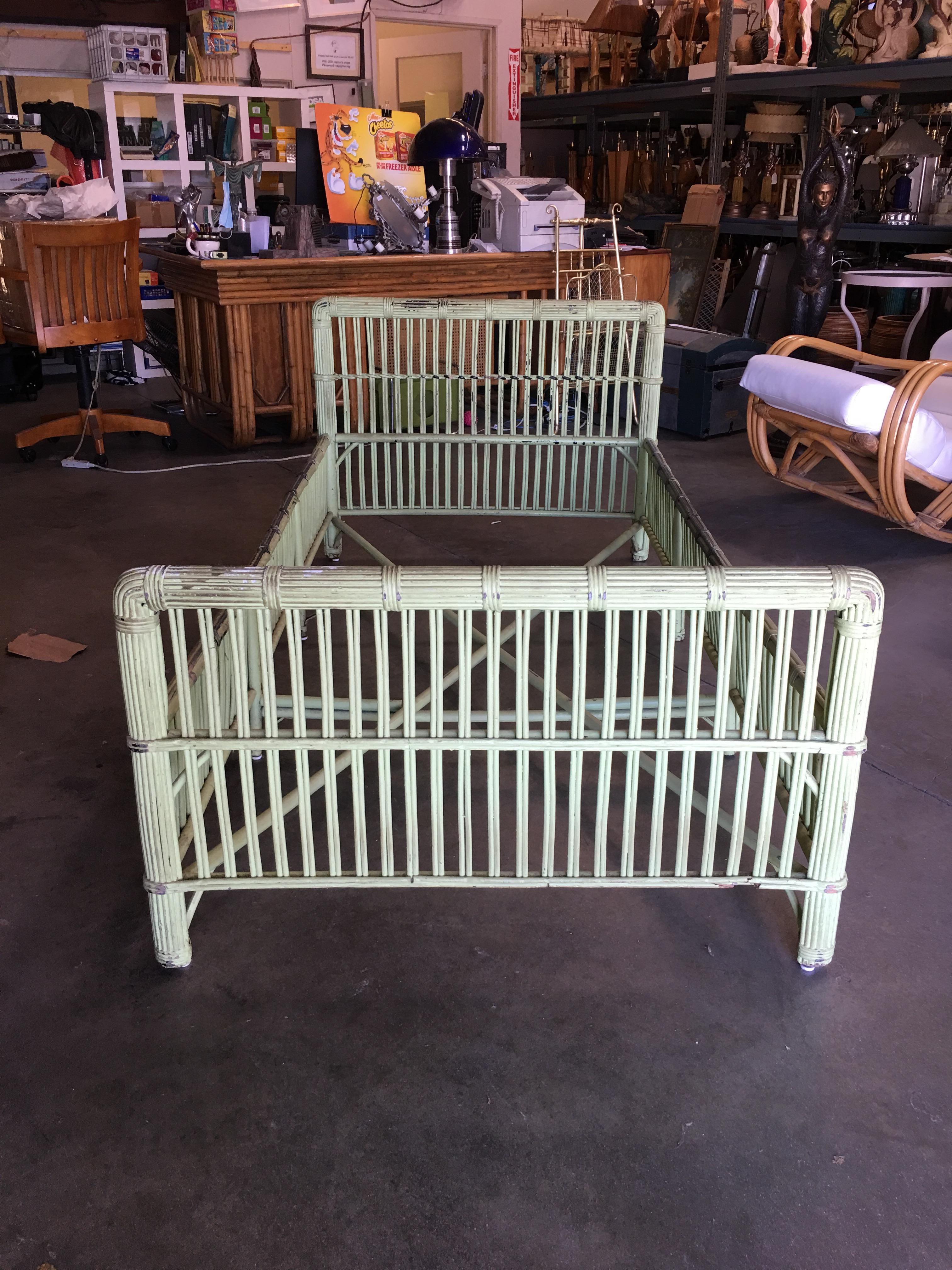 Green shabby chic stick rattan twin size sleigh bed frame.