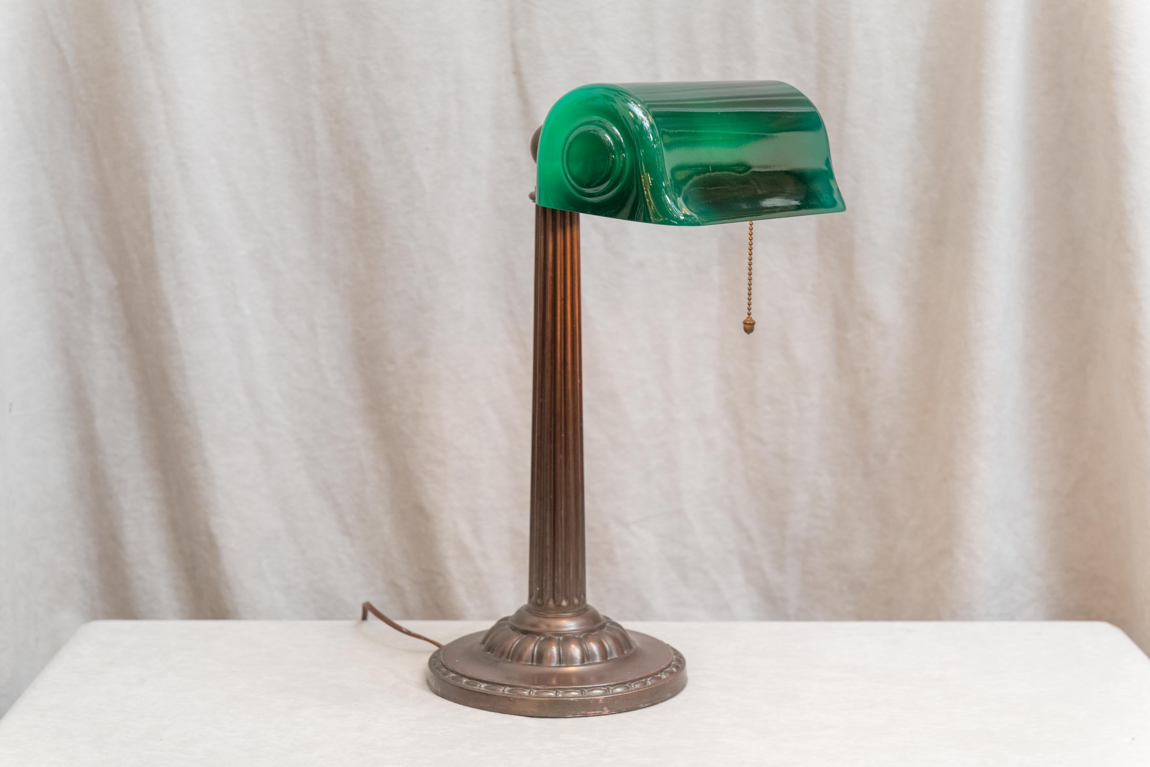 We try to carry a nice selection of desk lamps in our lighting shop. Our first priority is to find nice quality period banker's lamp. While several companies produced these lamps, we find that the Verdelite Co. are our most popular. While Emeralite