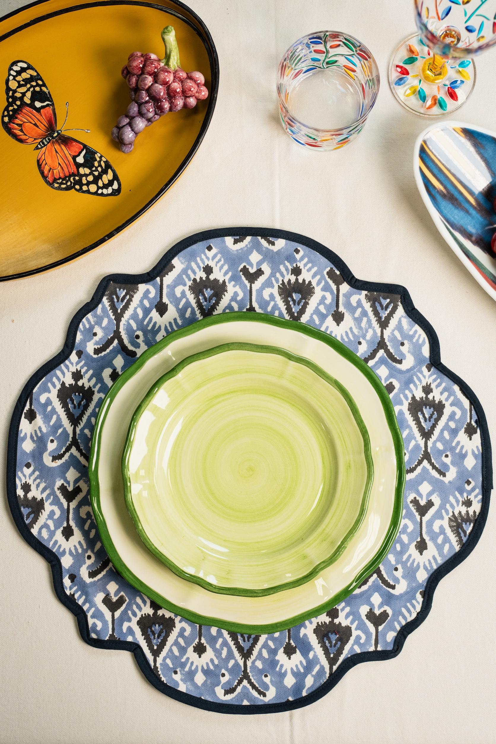 Discover the artistry of Italian craftsmanship with our Hand-Painted Ceramic Plates, featuring a magnificent shaded effect. Available in a range of elegant colors—green, pink, blue, and grey—these plates add a refined touch to any table setting.