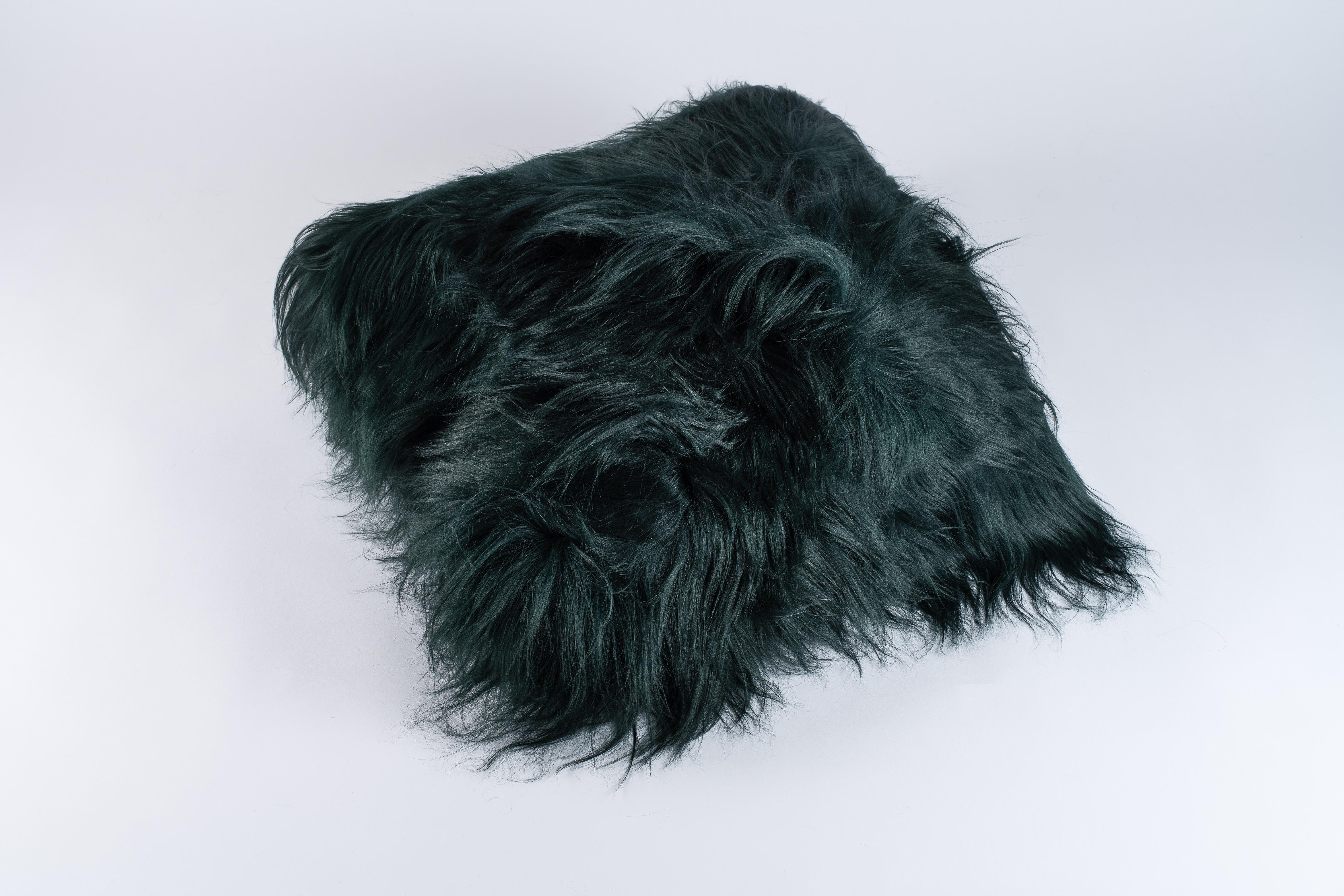 Wonderful pillow.
Exclusive fabric, Maison images d'Epinal
Dyed bottle green sheepskin.
Feather cushion.
 