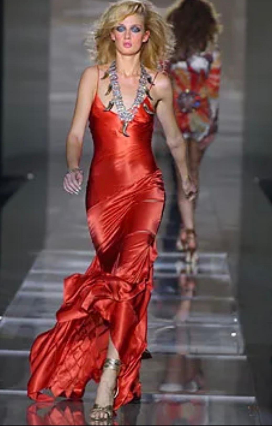 S/S 2004 Roberto Cavalli Dress
Similar dress in red shown on the runway
Gorgeous green silk fabric
Thin shoulder straps
V neckline
Bias cut
Fitted bodice with flared full hem
Cut out details on lower half of dress
Unlined
Slips on overhead

Marked