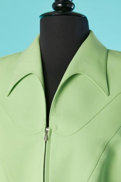 Green skirt suit with cut work and zip closure Thierry Mugler Circa 1990's