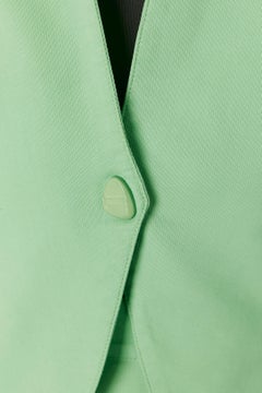 Green skirt suit with tulip's pocket THIERRY MUGLER ACTIV