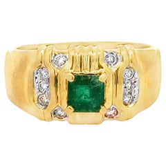Bague en or jaune 18k avec émeraude carrée verte et diamant