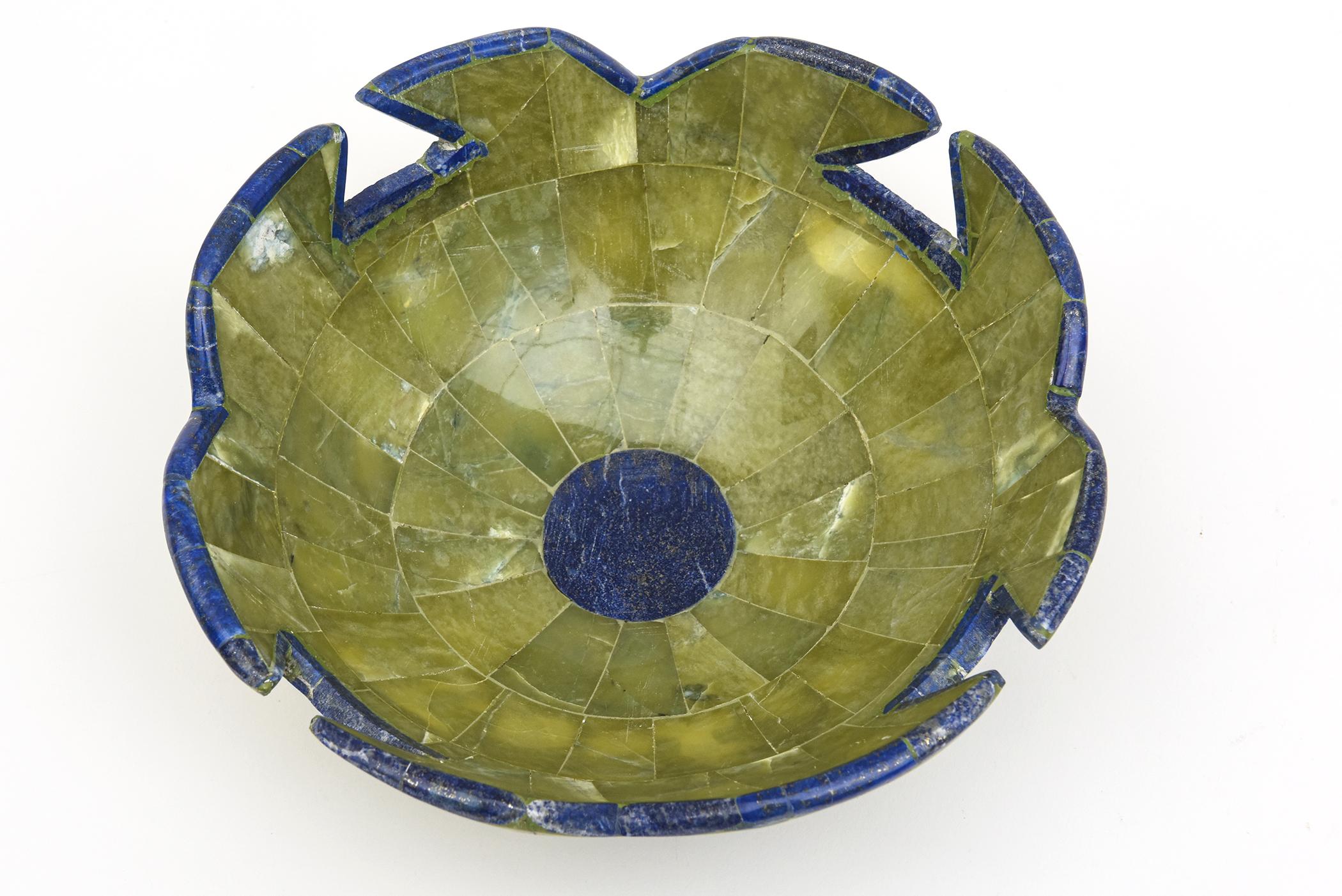 The beautiful combination in this scalloped bowl of the colors of the carved green stone set against the lapis lazuli blue is a knock out! From the 1980s. Great as a decorative bowl, desk accessory or for serving. The colors together are offset by
