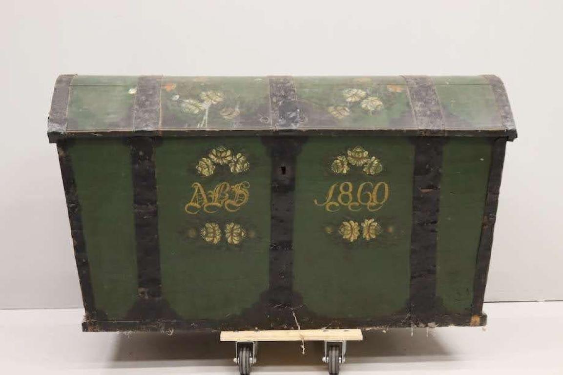 Green Swedish domed-top dowry chest with hand-painted flourishes and date ca. 1860. Old world Scandinavian marriage trunk painted green with hand painted floral detail, the initials 