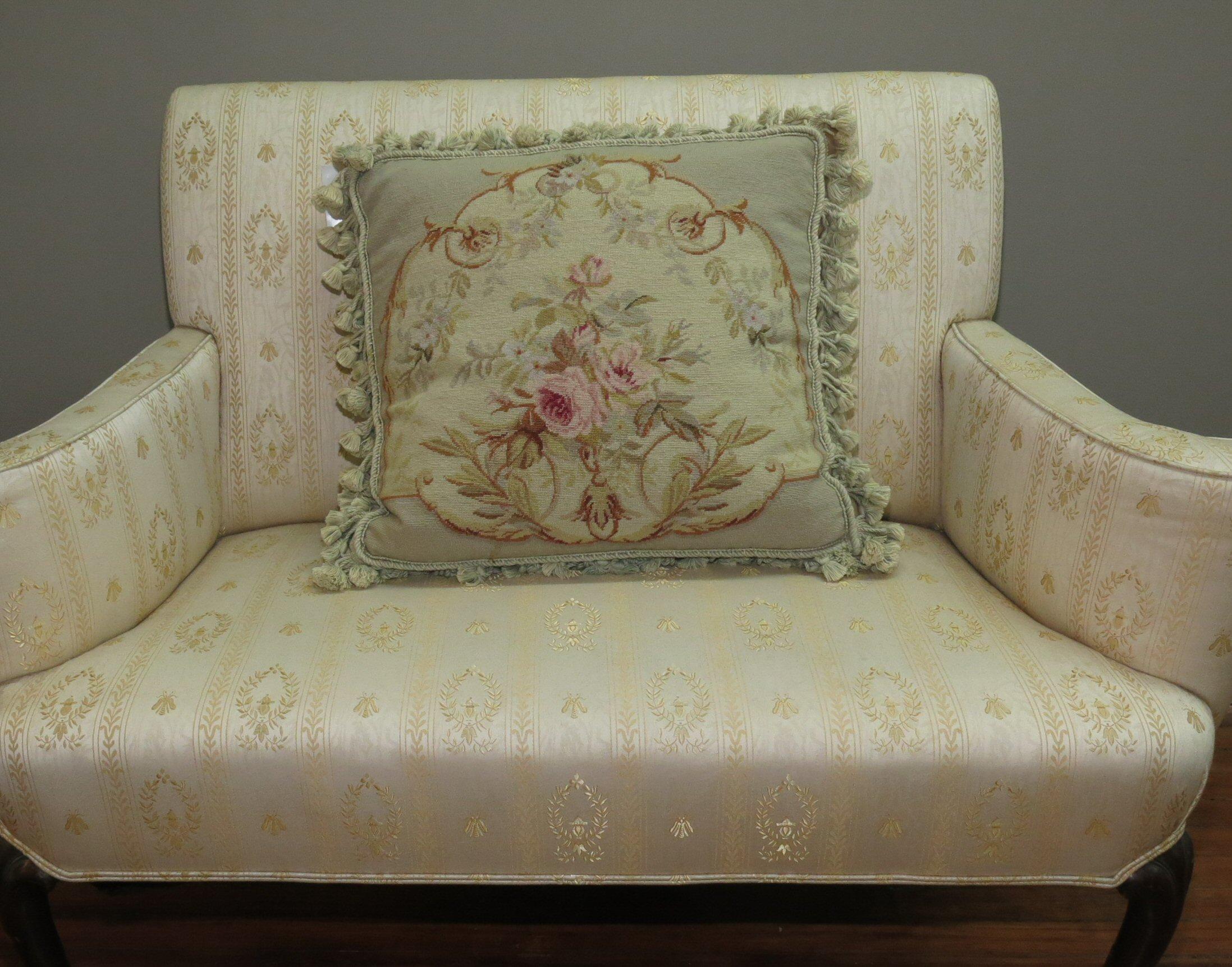 Authentic stand alone pillow made from a 19th century French Aubusson rug with a floral motif with green tasseled corners.


Measures: 19