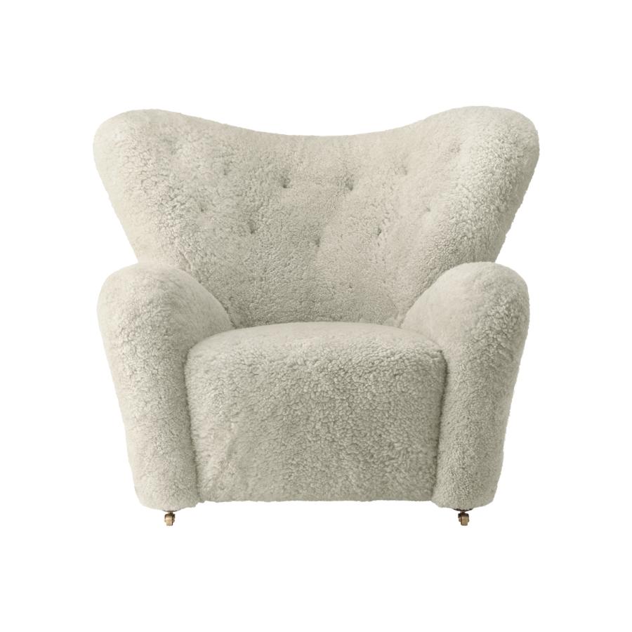 Green tea Sheepskin the tired man lounge chair by Lassen.
Dimensions: W 102 x D 87 x H 88 cm 
Materials: Sheepskin

Flemming Lassen designed the overstuffed easy chair, The Tired Man, for The Copenhagen Cabinetmakers’ Guild Competition in 1935.