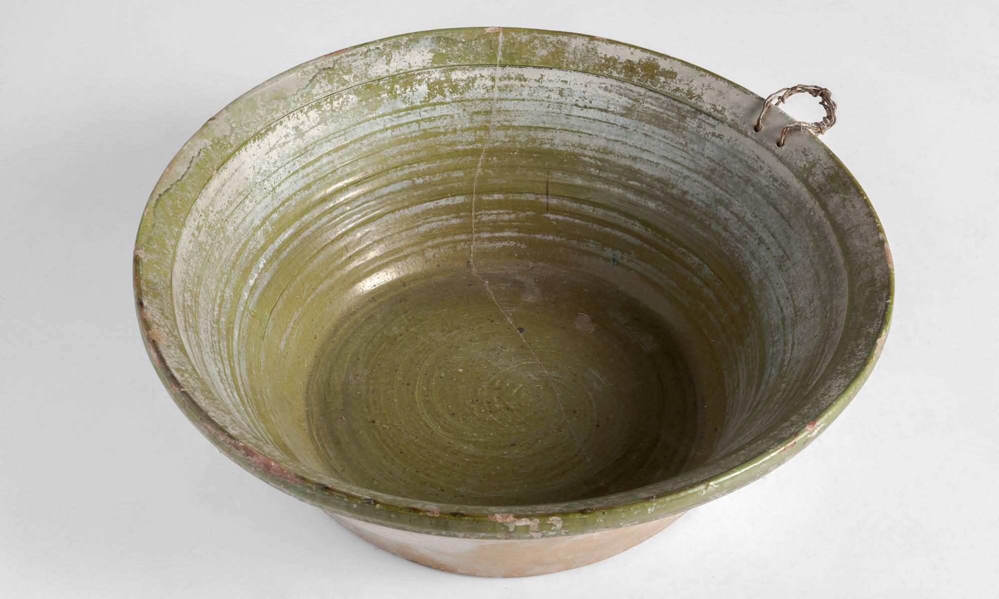 Green Terracotta bowl, Spain, circa 1950.

Large-scale handmade terracotta bowl with beautiful color.

Measures: 28