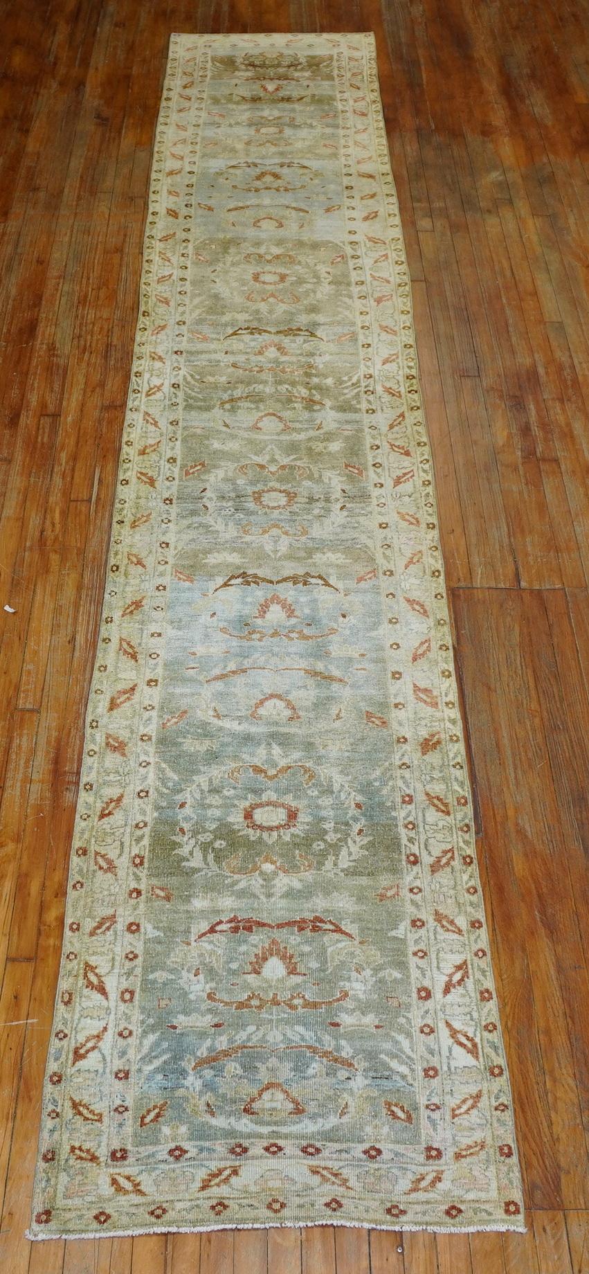 Predominant green and terracotta Persian Sarouk Runner from the early 20th century.

Measures: 2'10