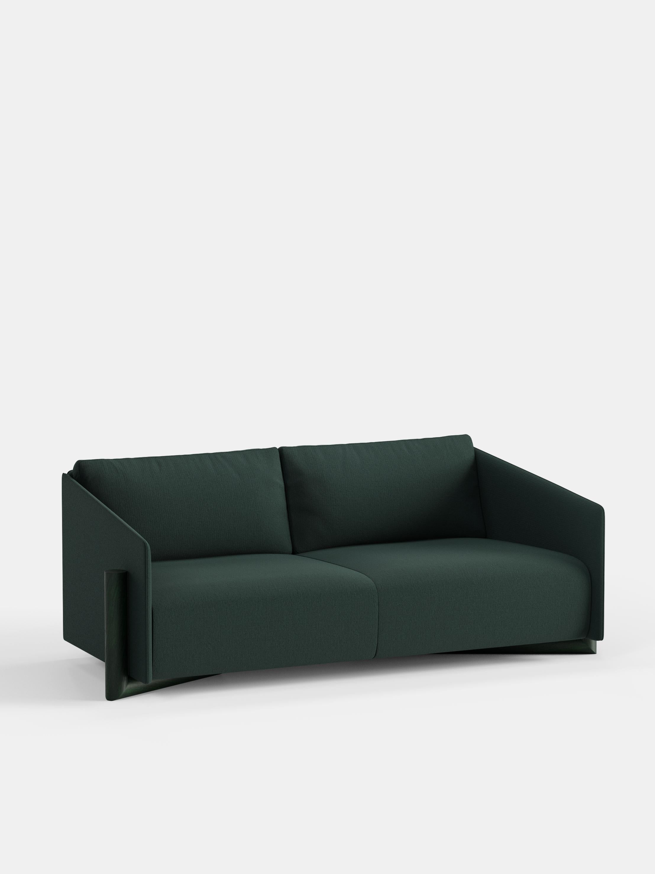 Green Timber 3 Seater Sofa by Kann Design
Dimensions: D 104.5 x W 200 x H 75 cm.
Materials: Solid wood, elastic belts, HR foam, fabric upholstery Kvadrat Vidar 1062 (94% wool, 6% nylon).
Available in other fabrics.

The strong presence of textile in