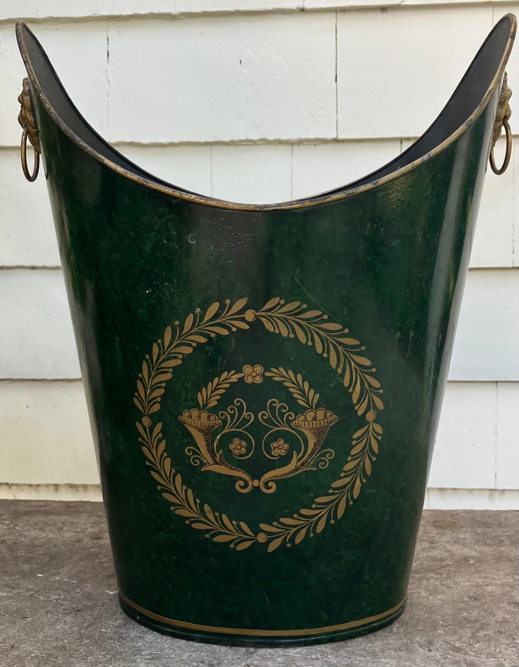 Vintage Empire Style navette shape litter basket with gold lion mask ring handles and neoclassical decorations.  United States, c. 1930's
 Dimensions: 14.5