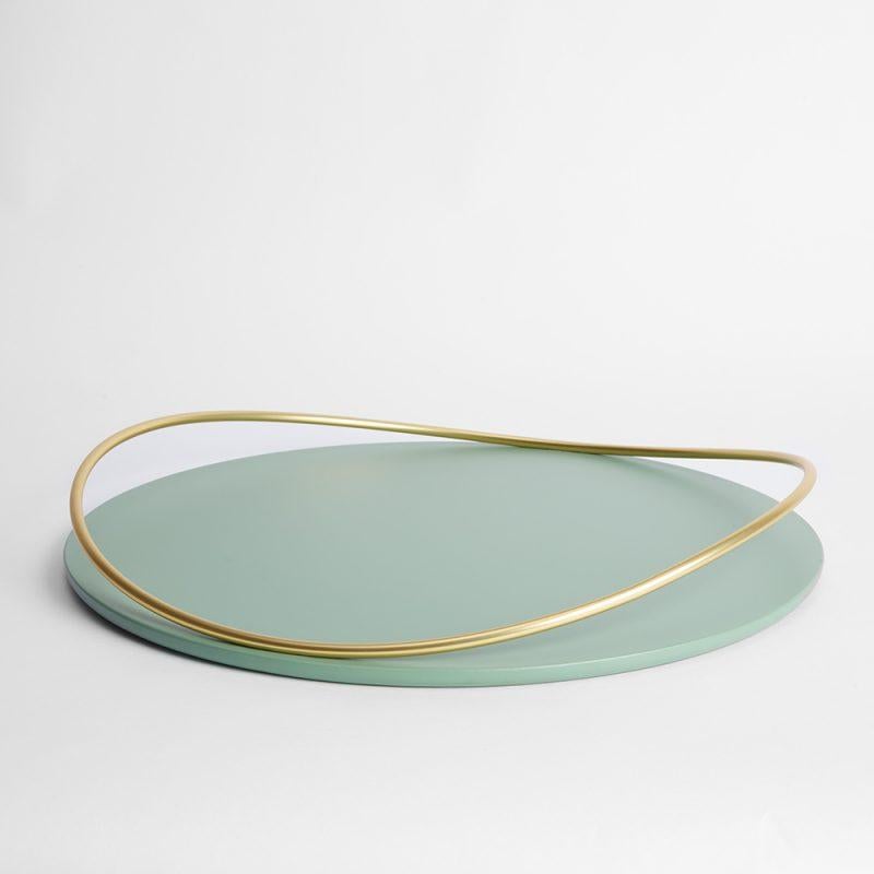 Green Touché E Tray by Mason Editions
Dimensions: D 48 × 7 cm
Materials: Iron and MDF
Colours: taupe, cotton, burgundy, sage green, petrol green

A light metal rod that rests on the surface and then lifts up, almost touching the surface with a