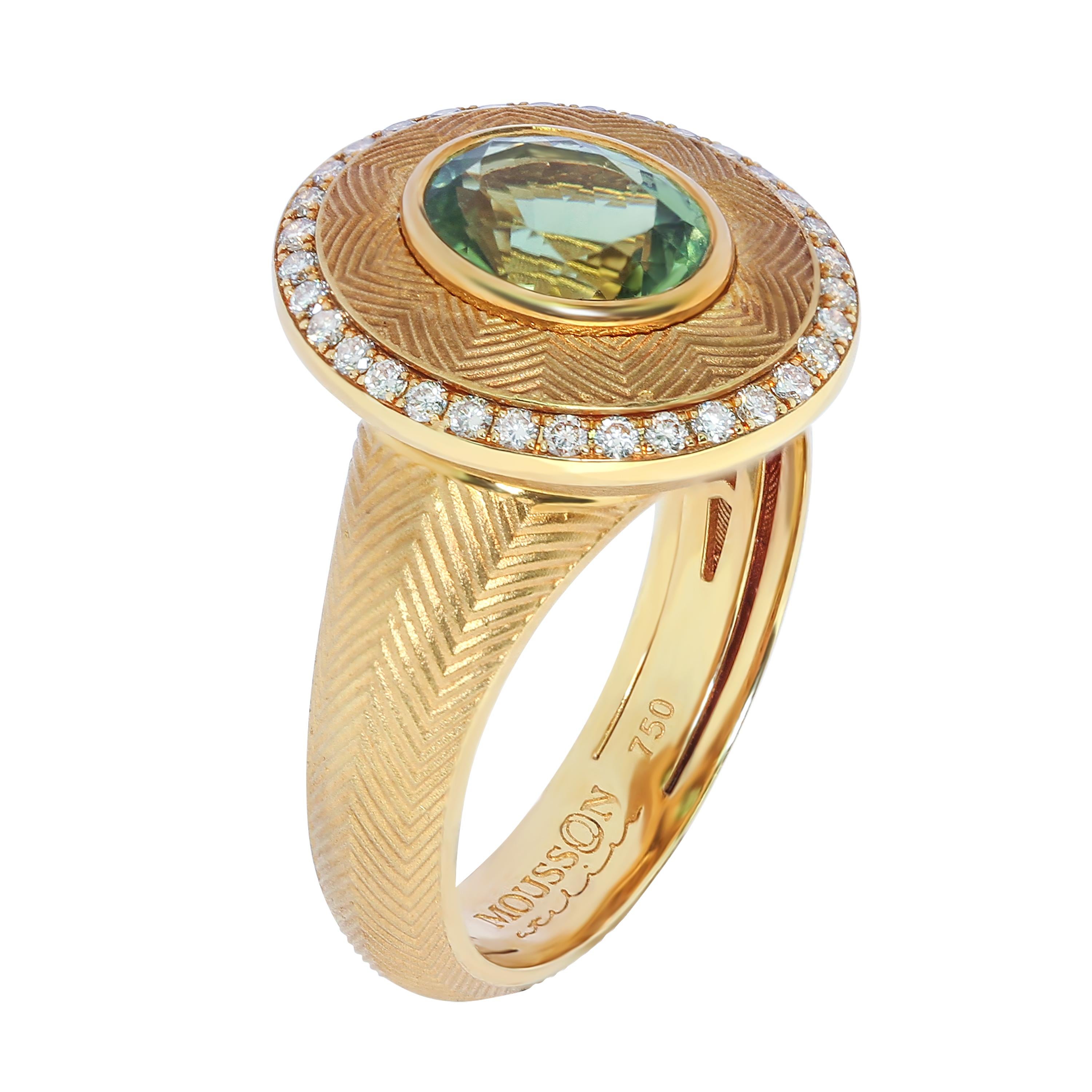 Grüner Turmalin 1,70 Karat Champagner Diamanten 18 Karat Gelbgold Tweed Ring
Unser Markenzeichen, die Textur 