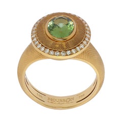 Anello con tormalina verde da 1,70 carati e diamanti champagne in oro giallo 18 carati