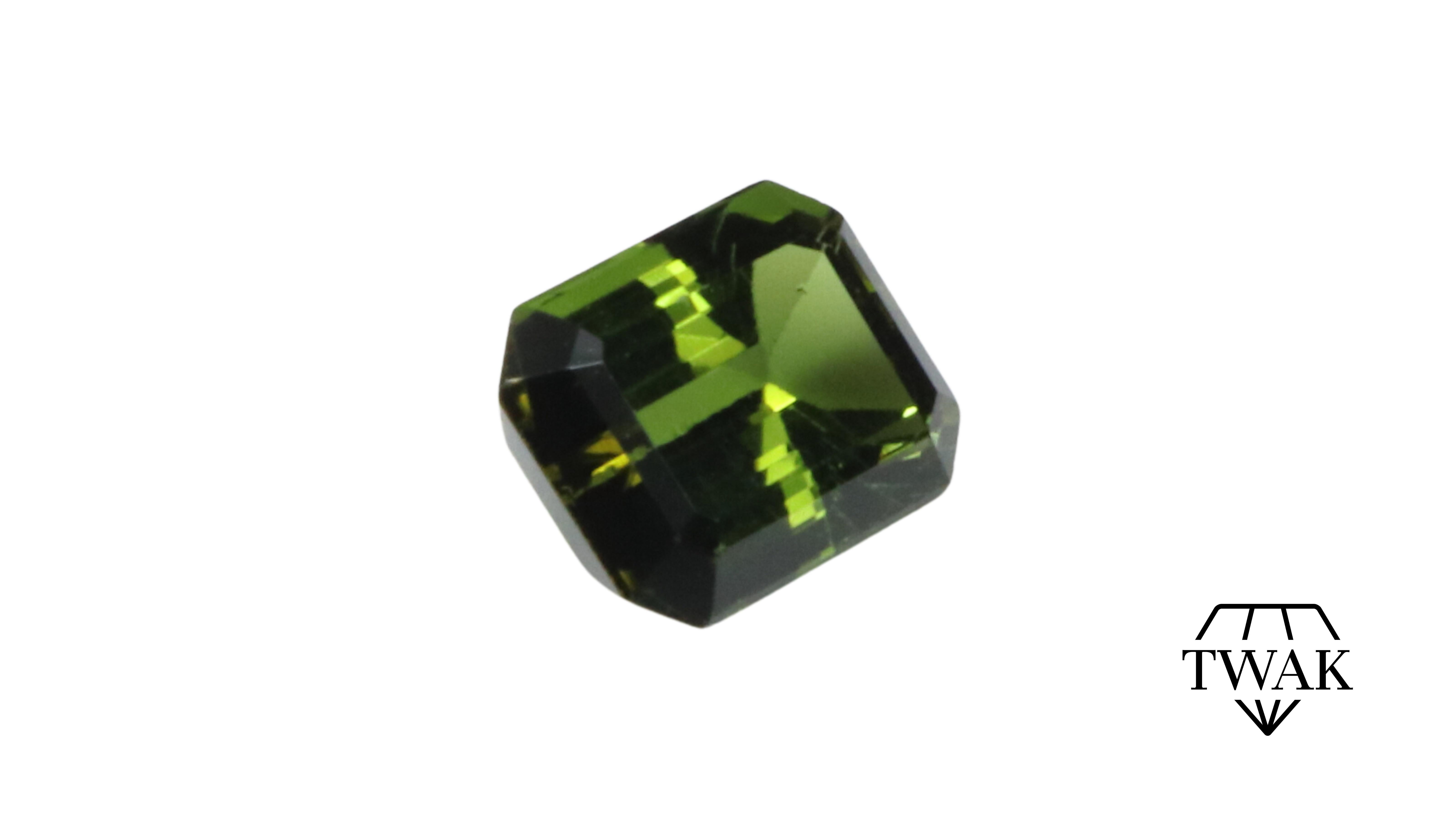 One Green Tourmaline, rectangular / emerald cut.

A beautifully cut stone with brilliance and excellent color depth. It has the same Intense/Vivid Green color with Yellow overtones of the chrome tourmalines.

Details and description:
Color: