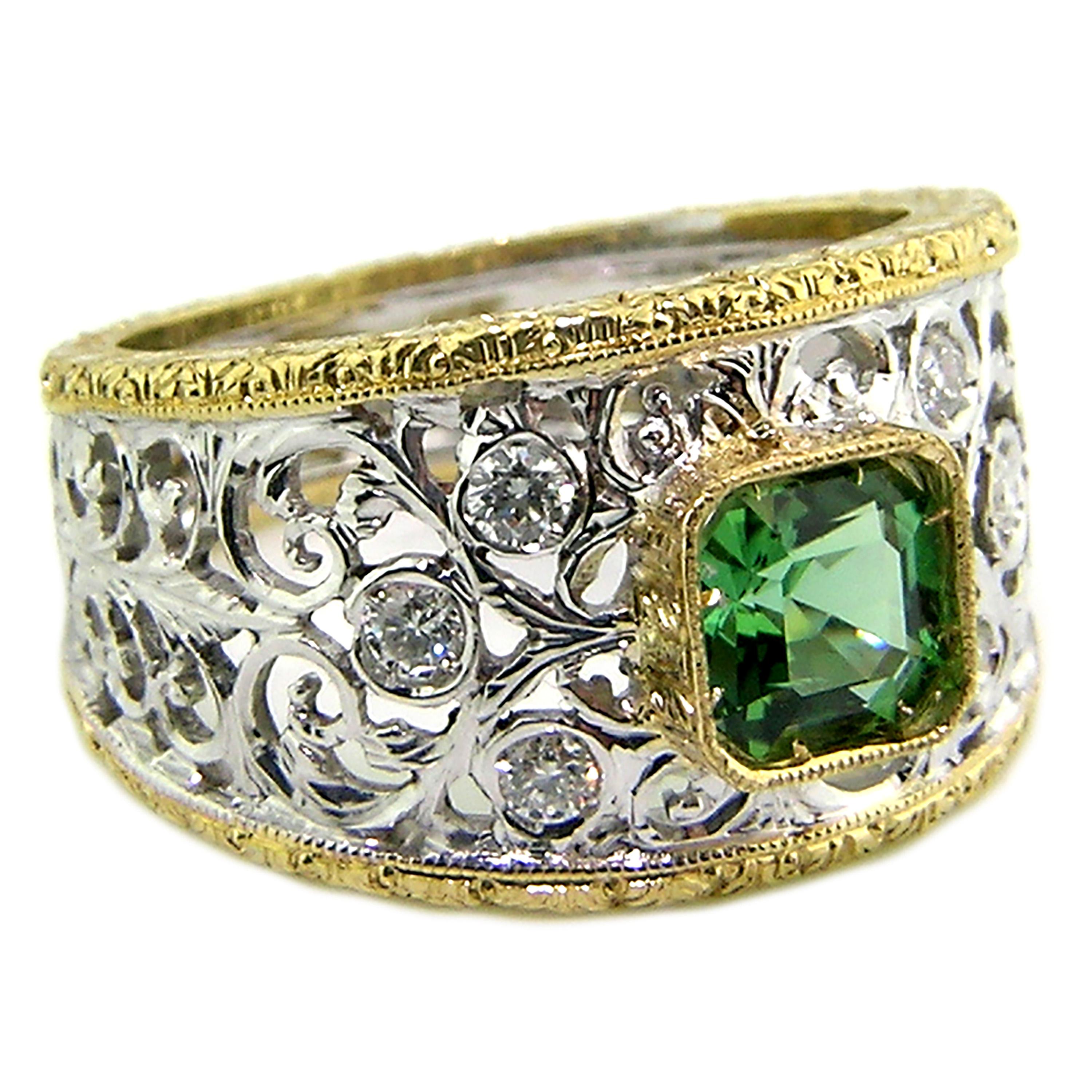 The Contessa ring is the perfect frame for this bright and lively Ascher-cut green tourmaline. This tourmaline is simply the greenest green, and the big look of this small gem is amazing in person.

This 18kt ring is accented with six fine diamonds.