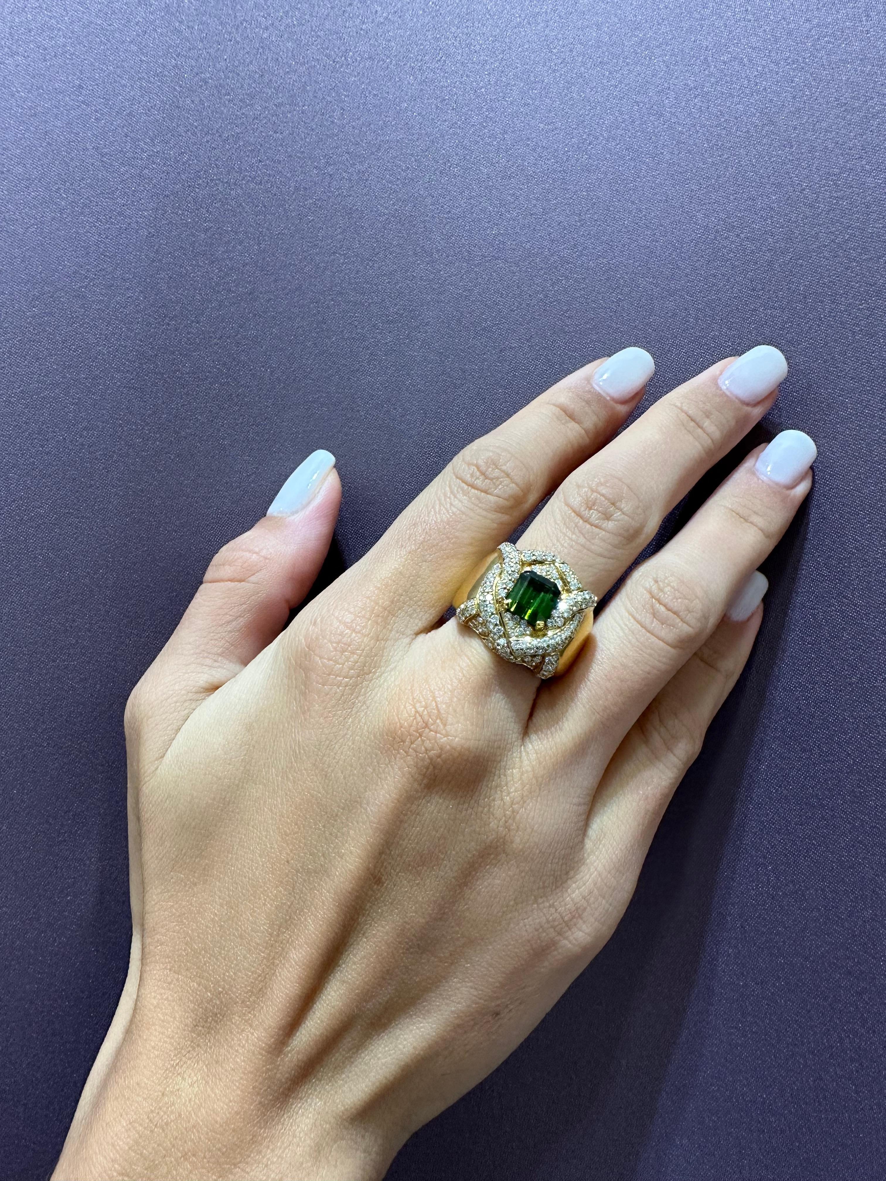 Rosior Cocktail Ring set in Yellow Gold with:
- 1 Green Tourmaline weighing 2,09 ct;
- 149 G-VVS Natural Diamonds weighing 1,39 ct.
Weight in 19.2K Gold: 19.9 g.
Handmade in Portugal.
Stamped by the portuguese assay office as 19.2K Gold.
Stamped