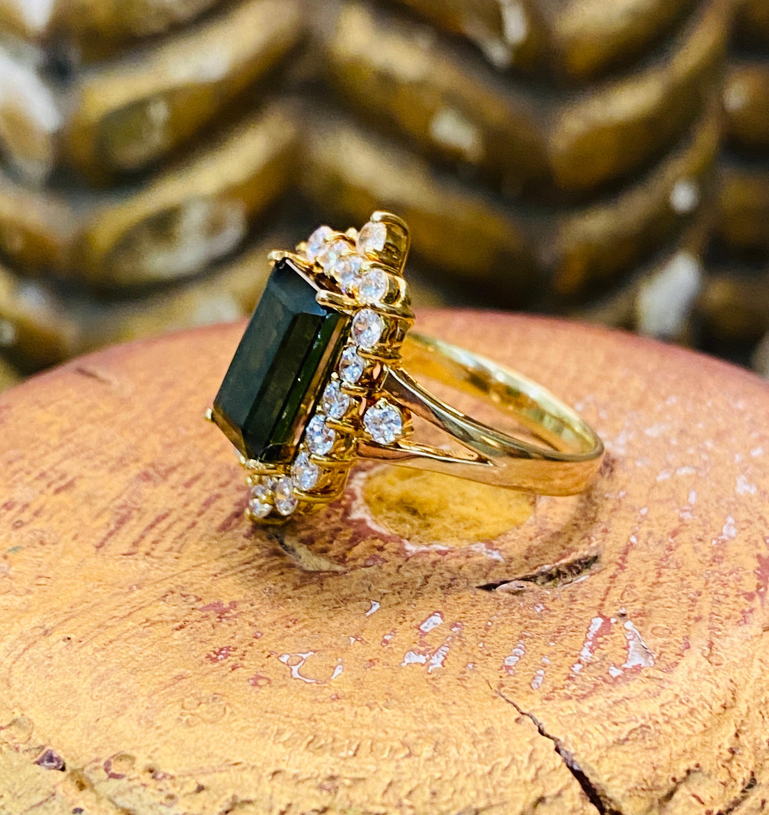 14k yellow gold 3.25 carat green tourmaline with 1.32 carat total weight G Vs round brilliant diamonds. 5Dwt. Size 8.75 US