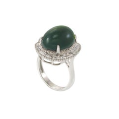 Green Tourmaline and Diamond Halo Ring in 18KT White Gold