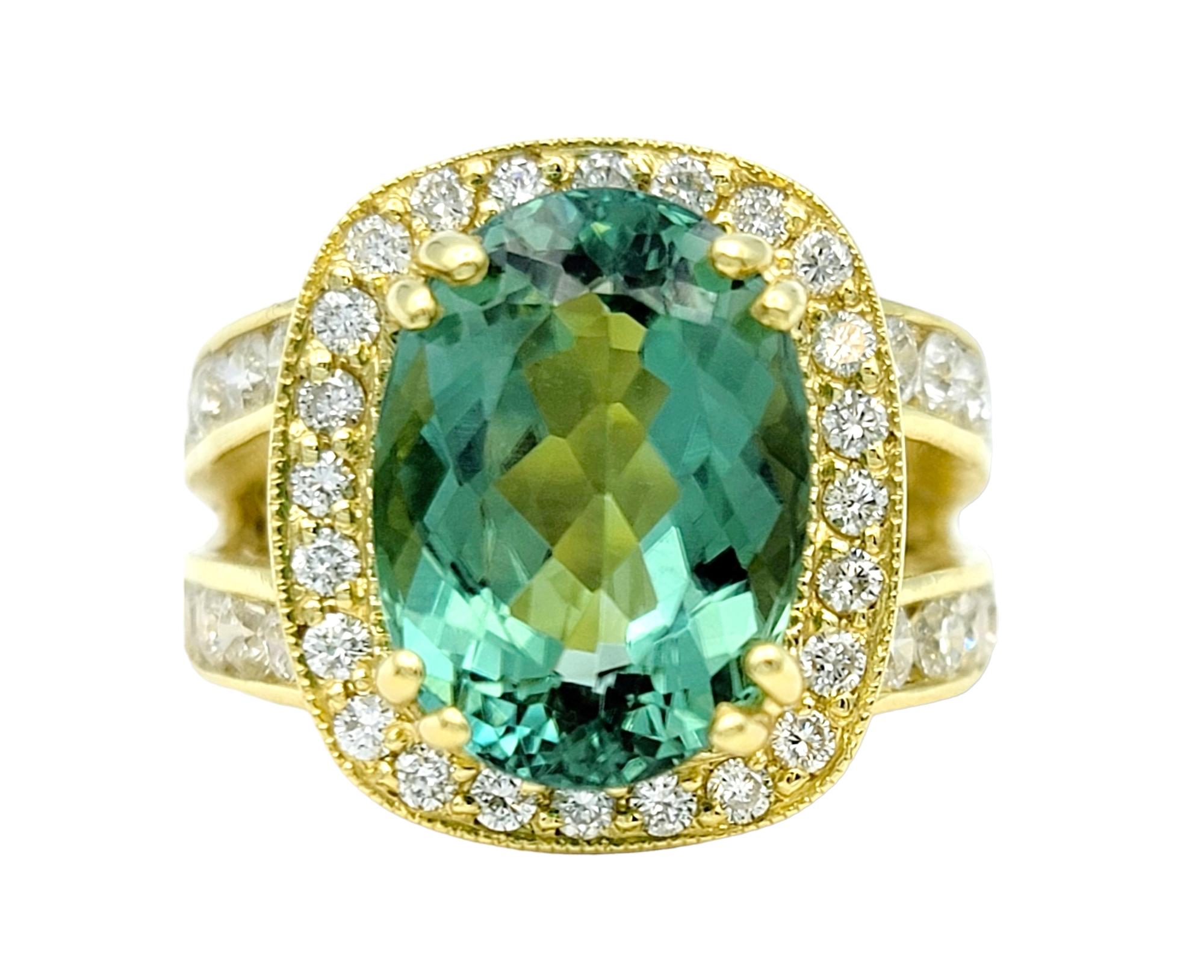 Ring Size: 5.5

This exquisite cocktail ring showcases an elegant blend of timeless sophistication and modern allure. Crafted in lustrous 18-karat yellow gold, the ring features a captivating oval-cut green tourmaline at its heart, radiating a rich