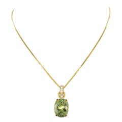 Collier de tourmalines vertes et diamants en or jaune 18 carats