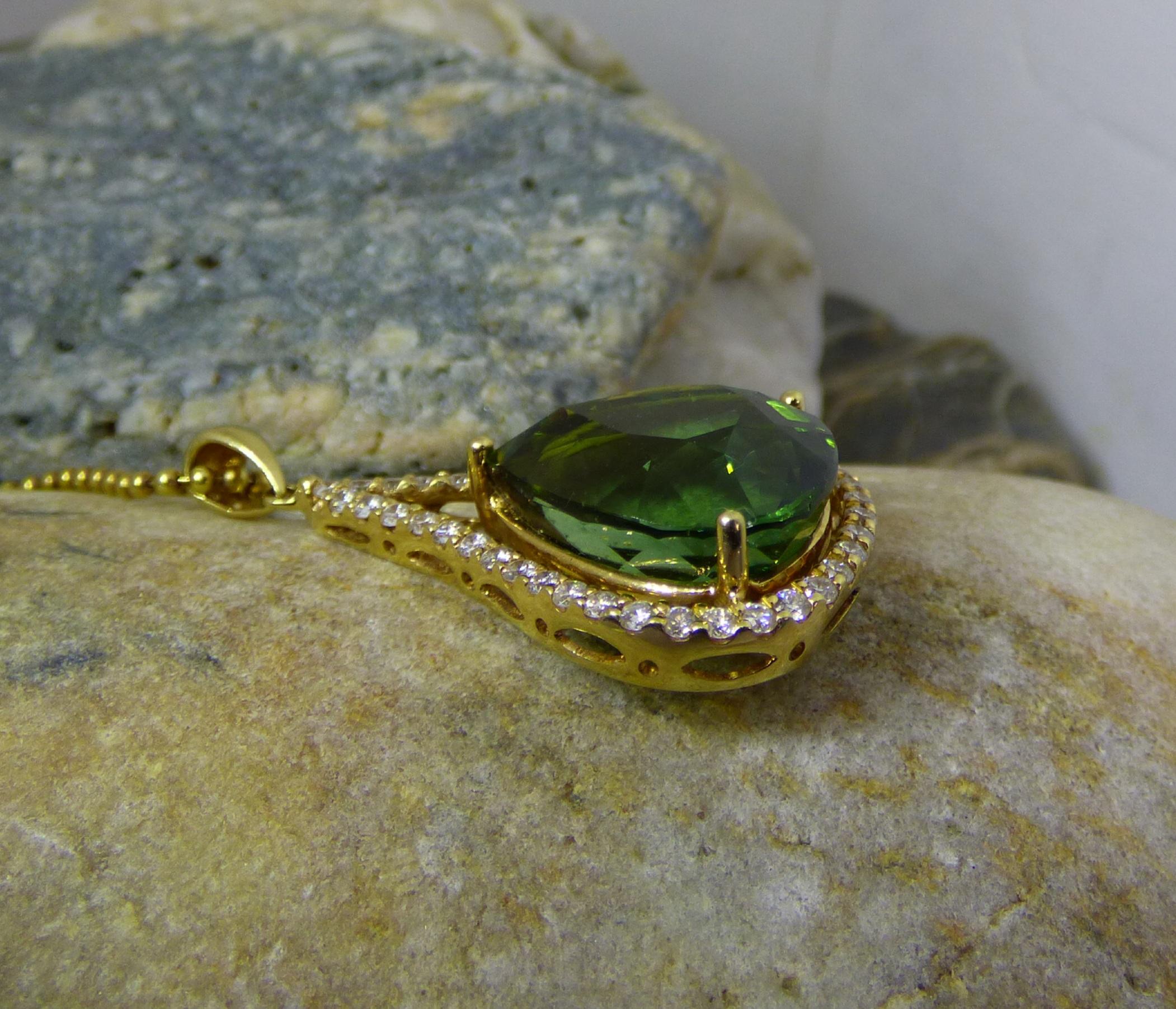 Pear Cut Green Tourmaline (17.82ct.) and Diamond Pendant in 18ct. Yellow Gold For Sale
