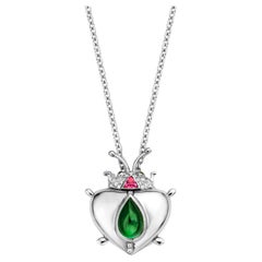 Collier pendentif en or blanc, tourmaline verte et grenat mandarin