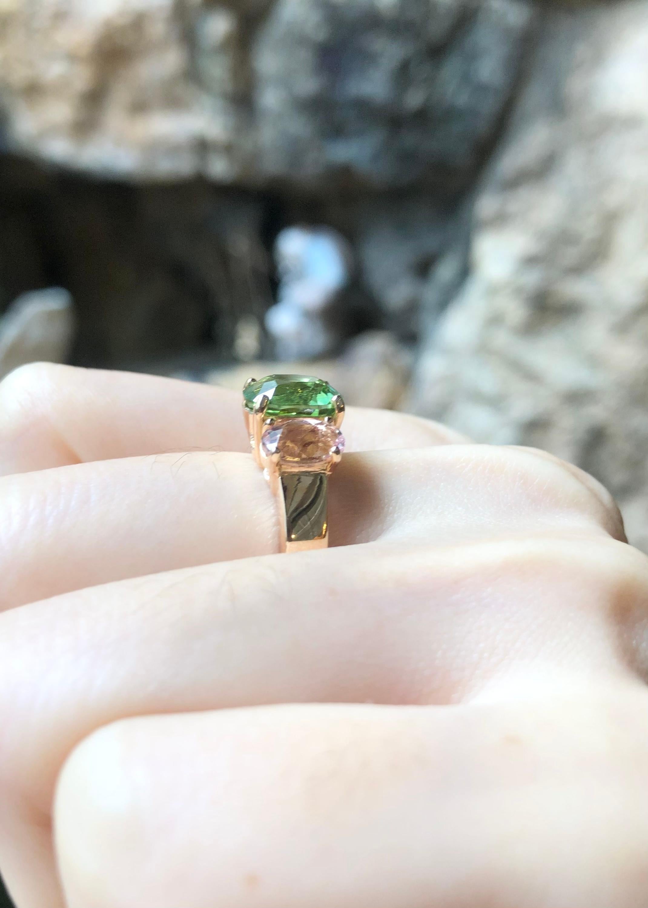 Green Tourmaline 2.55 carats and Morganite 1.73 carats Ring set in 18K Rose Gold Settings

Width:  1.6 cm 
Length: 0.9 cm
Ring Size: 52
Total Weight: 7.42 grams

