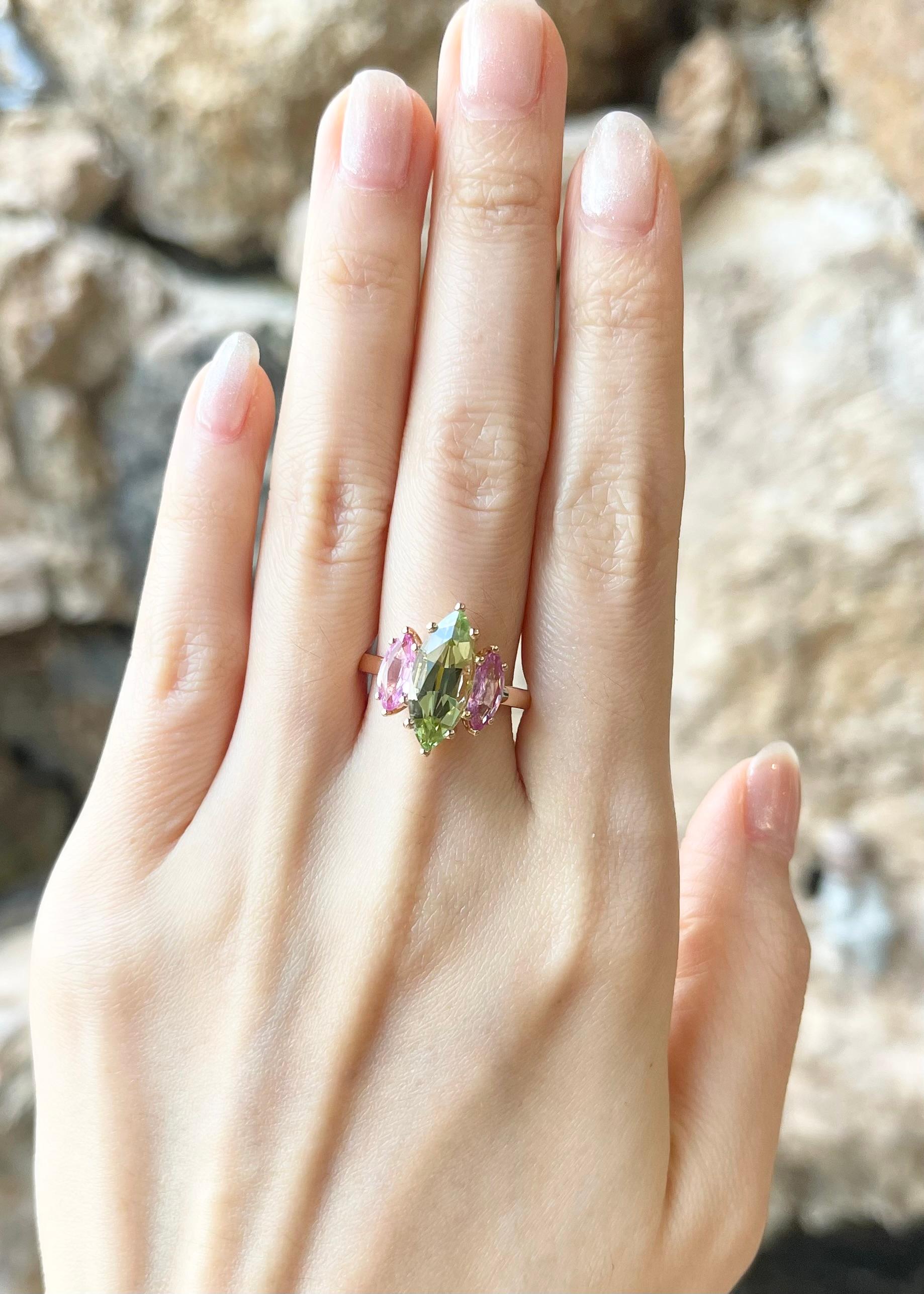 Green Tourmaline 6.64 carats and Pink Sapphire 1.43 carats Ring set in 18K Rose Gold Settings

Width:  1.3 cm 
Length: 1.6 cm
Ring Size: 52
Total Weight: 5.89 grams

