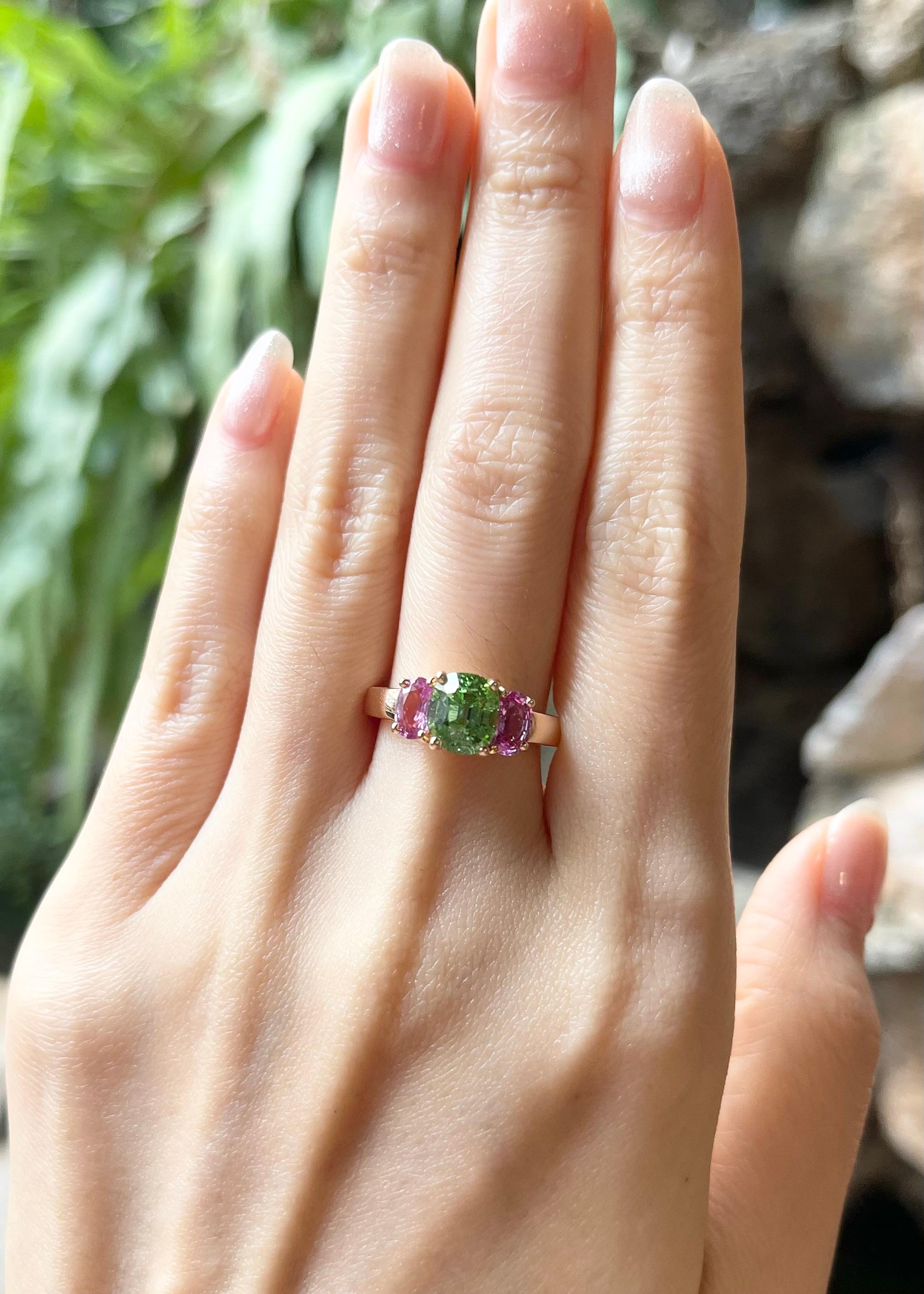 Green Tourmaline 1.99 carats and Pink Sapphire 1.04 carats Ring set in 18K Rose Gold Settings

Width:  1.3cm 
Length: 0.7 cm
Ring Size: 51
Total Weight: 5.81 grams

