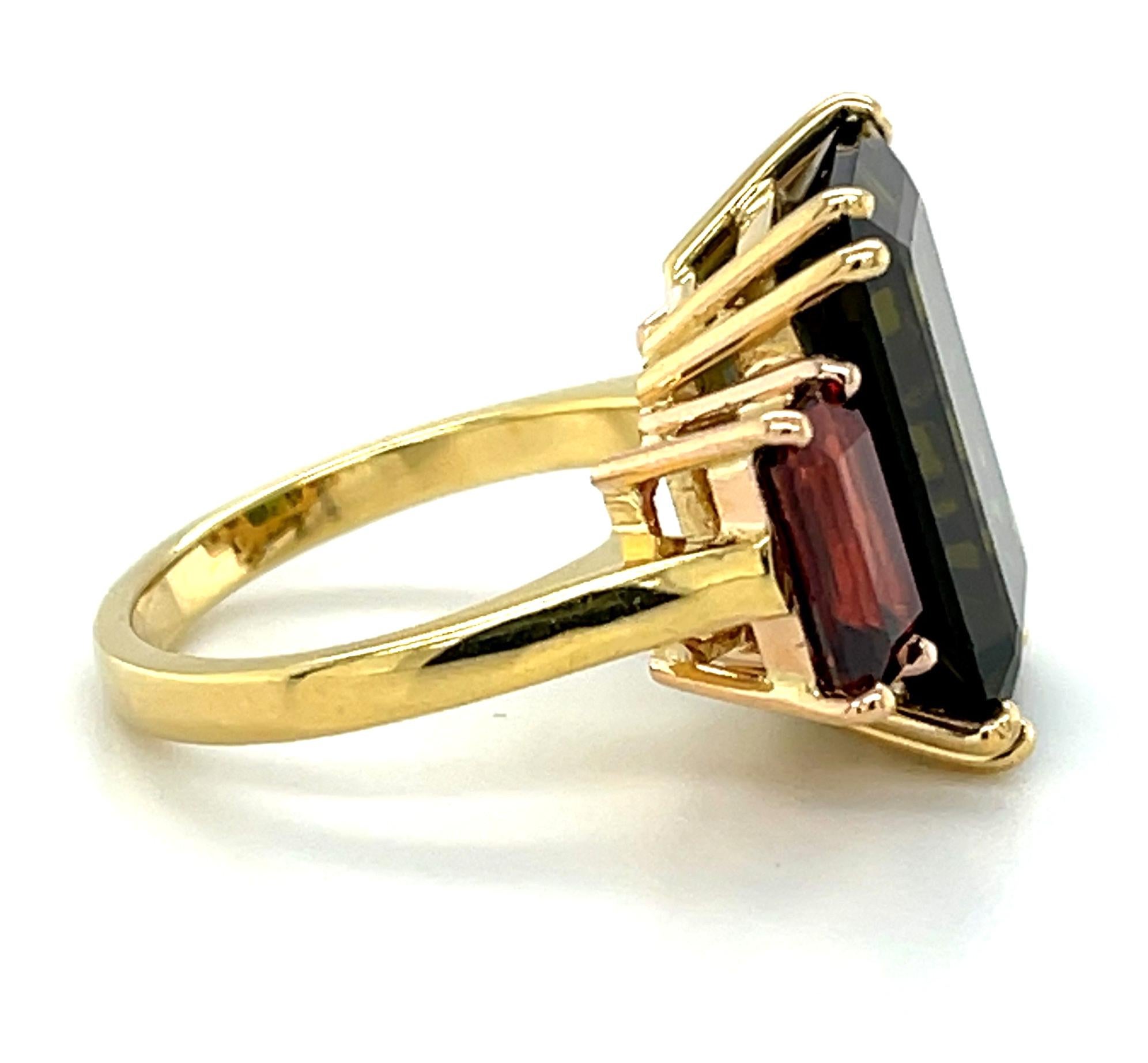 Women's Green Tourmaline and Red Garnet Three-Stone Ring in 18k Yellow and Rose Gold For Sale