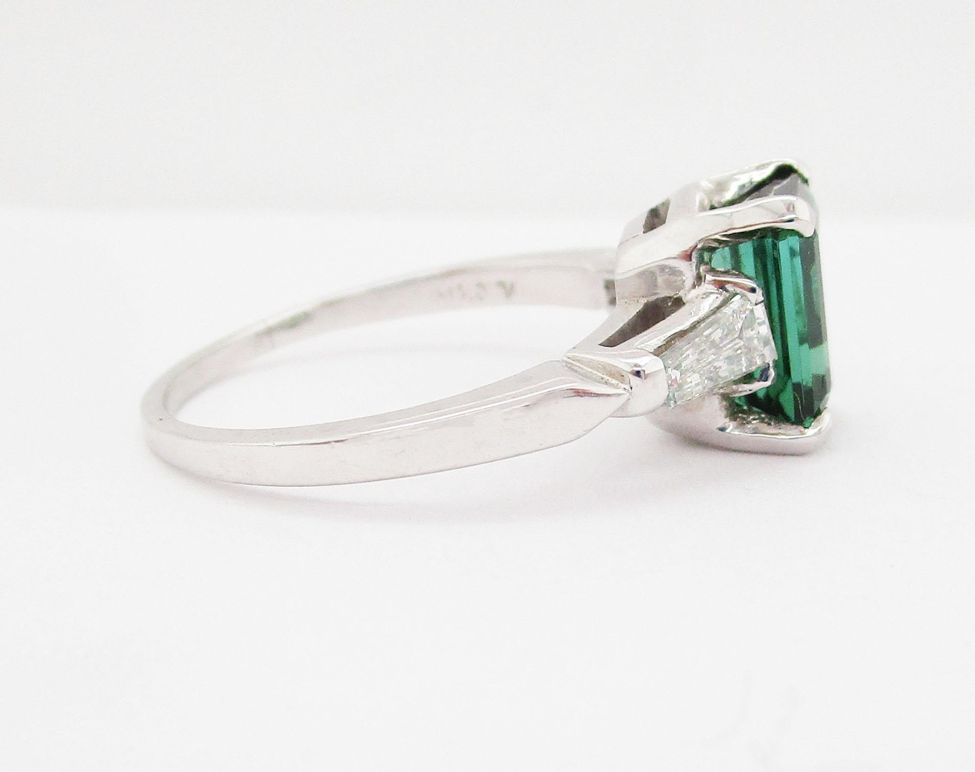 Emerald Cut Green Tourmaline and Tapered Baguette Diamond Platinum Ring For Sale