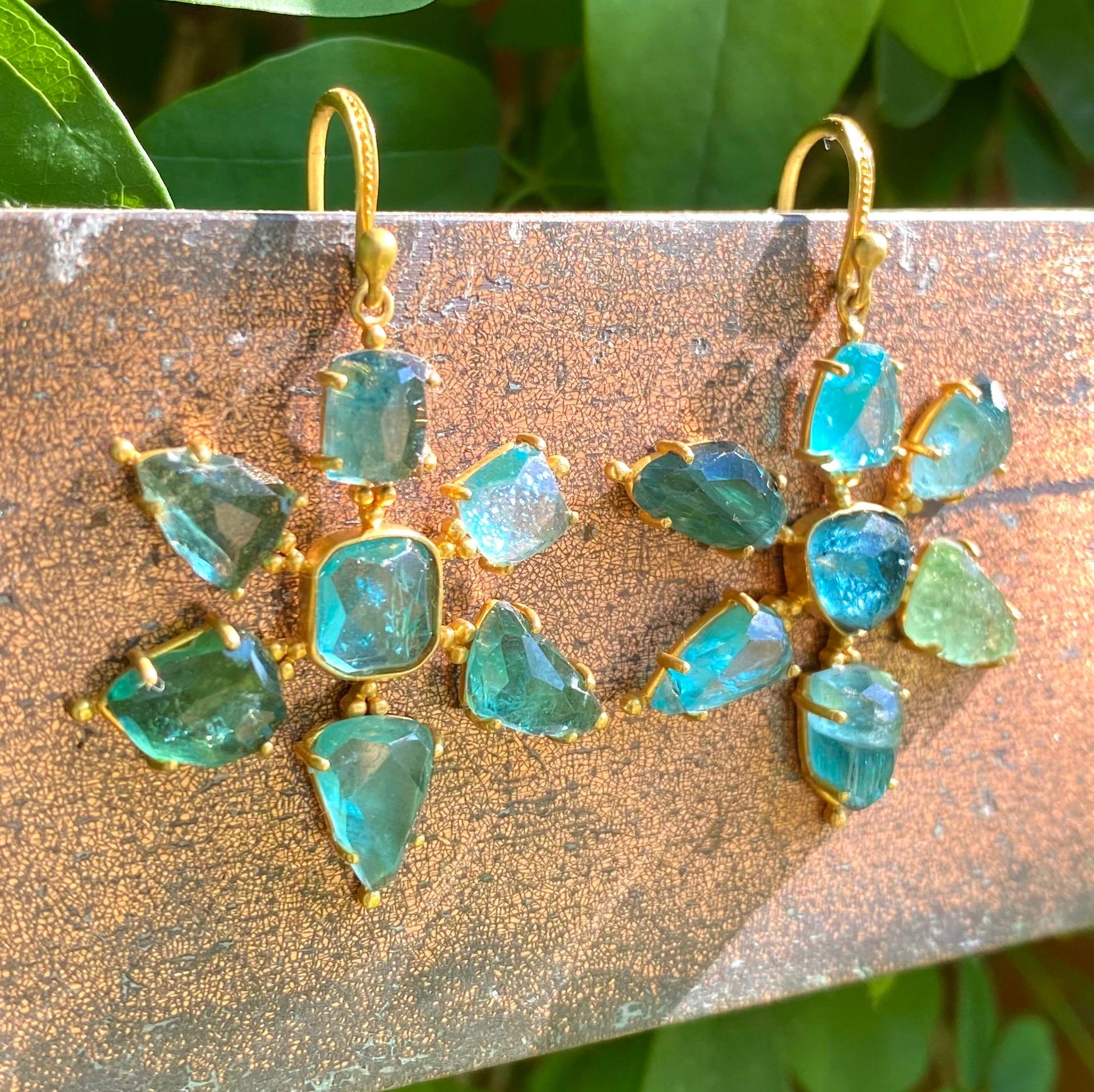 Designed by award winning jewelry designer, Lauren Harper, these Green Tourmaline and Apatite Earrings are set in a beautiful warm 18kt Gold  flower motif. Lovely variety of shades of green color with stones full of natural beauty. Lightweight
