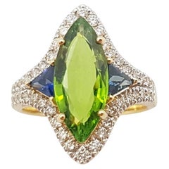 Ring mit grünem Turmalin, blauem Saphir und braunem Diamant in 18 Karat Goldfassung