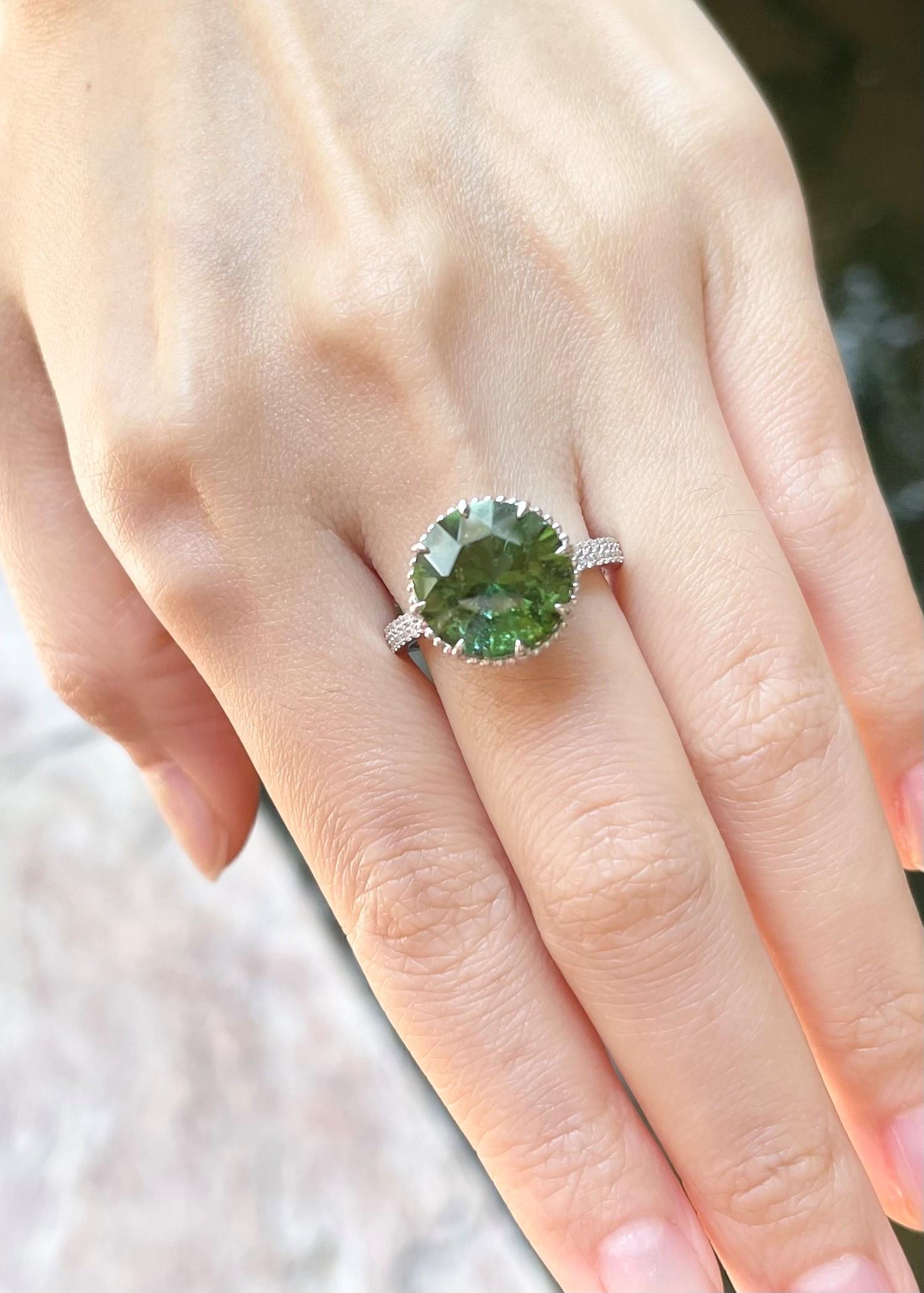 Women's Green Tourmaline, Blue Sapphire and Diamond Ring set in 18K White Gold Settings For Sale