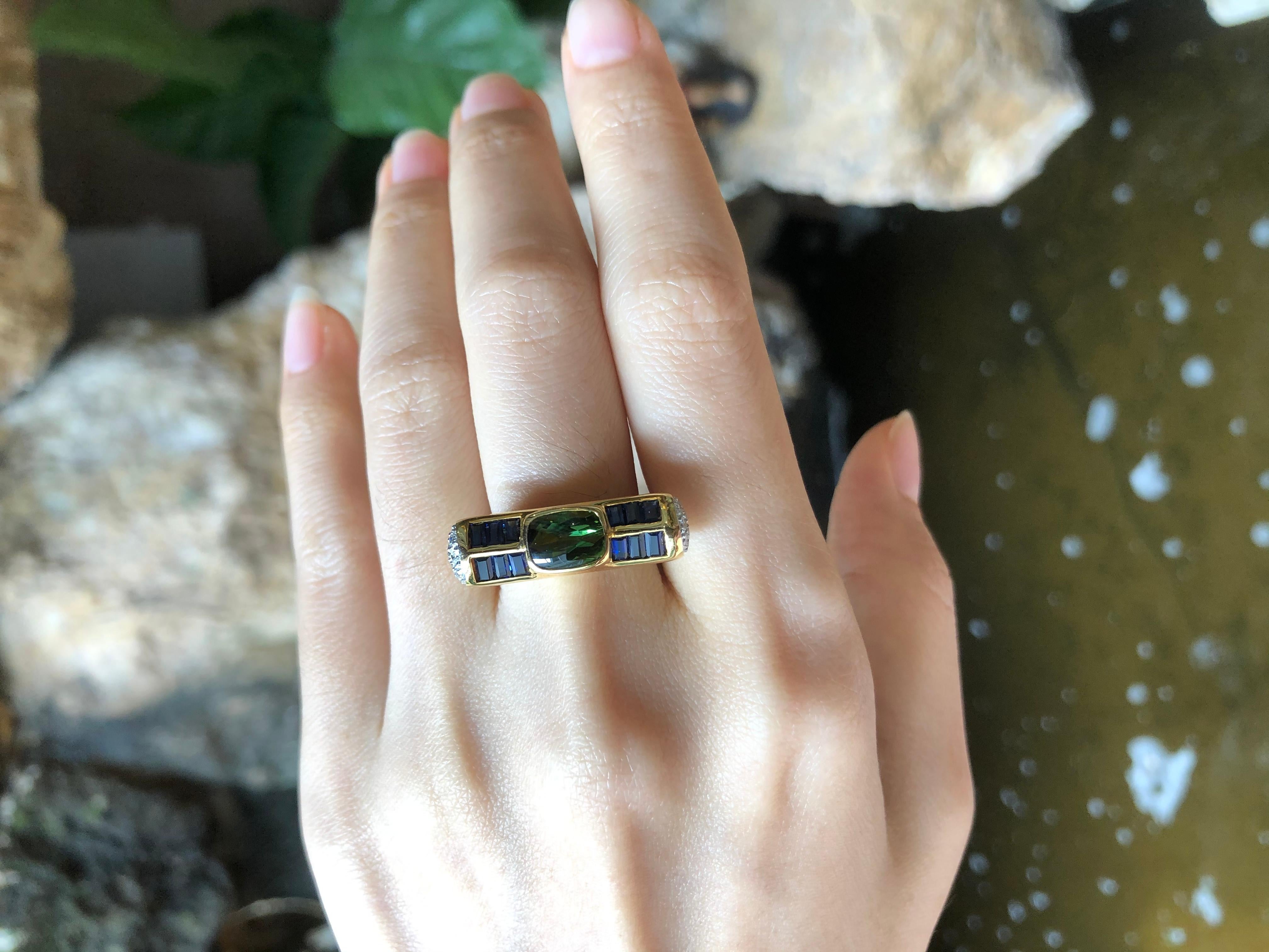 Contemporary Green Tourmaline, Blue Sapphire with Diamond Ring Set in 18 Karat Gold Settings For Sale